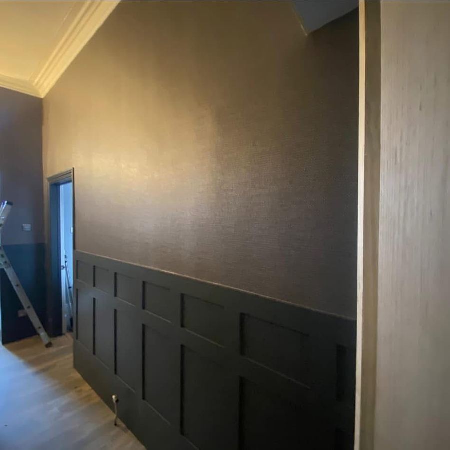Hallway with dark panelling and new flooring