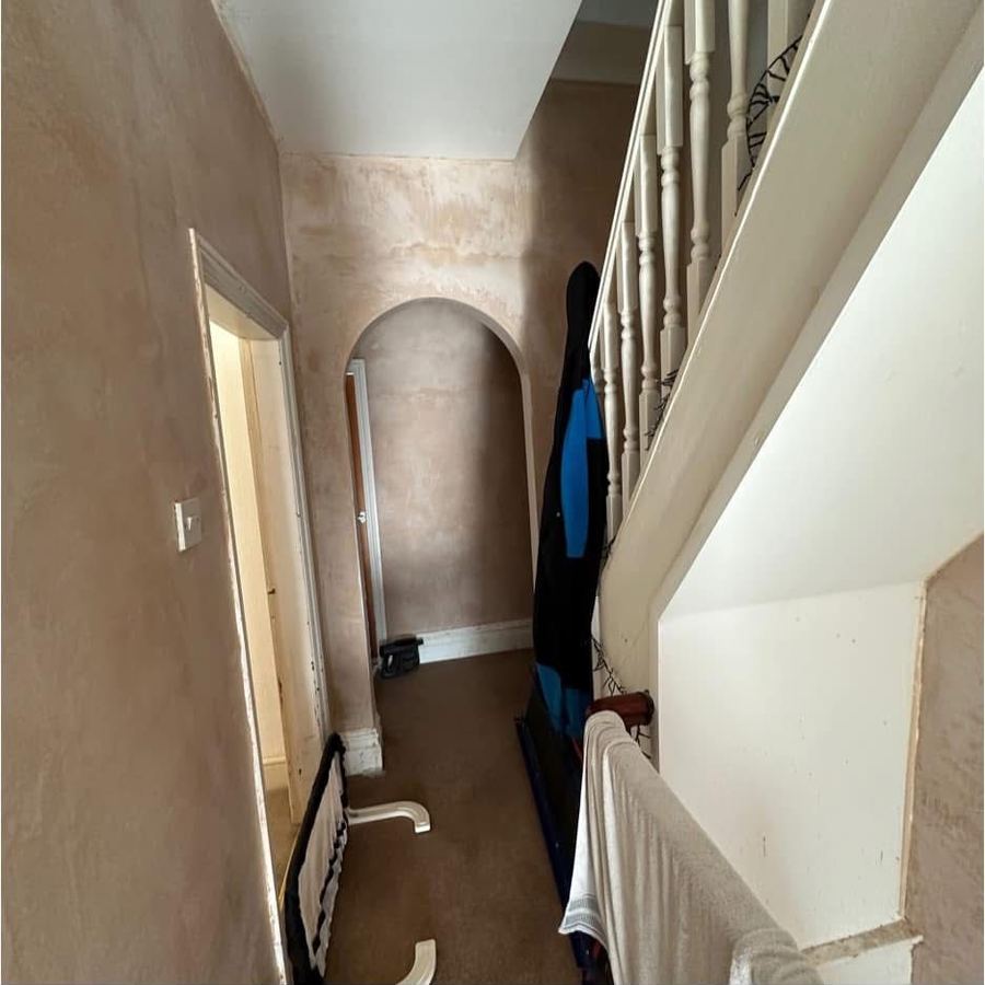 Landing with bare plaster walls before decoration