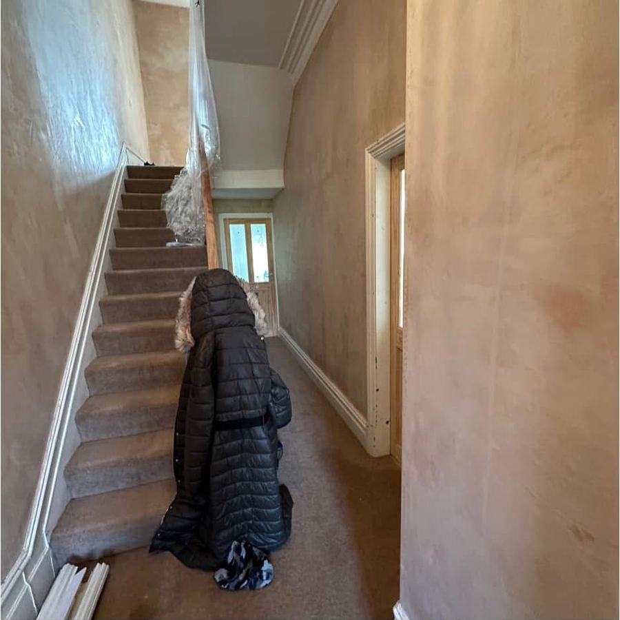 Hallway with bare plaster before panelling