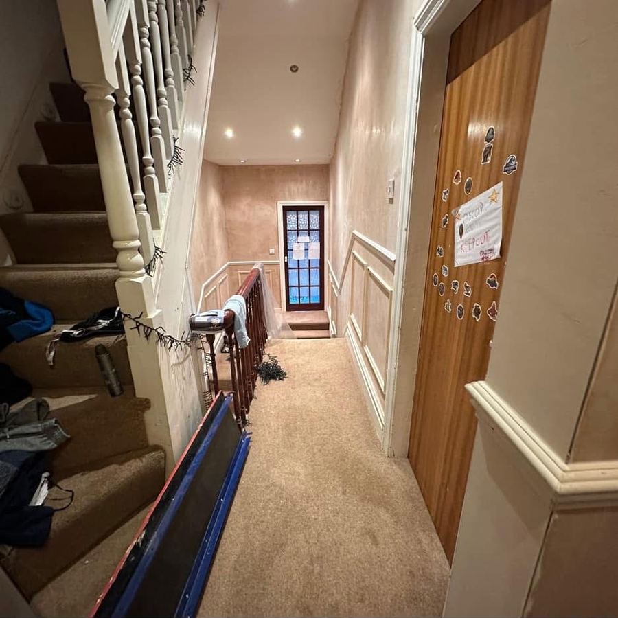 Cluttered landing before redecoration